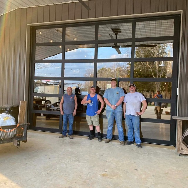 Modern full-view glass garage door installation